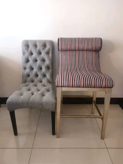 A brand new exquisite gray battoned occasional chair.
