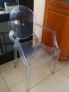 Ghost chairs 1 arm chair and 3 dinning chairs sold per each