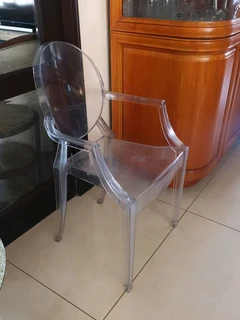 Ghost chairs 1 arm chair and 3 dinning chairs sold per each