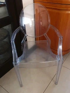 Ghost chairs 1 arm chair and 3 dinning chairs sold per each