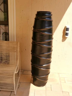 A stunning full length designer vase in brand new condition. Dimensions H140/W40