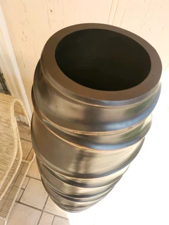 A stunning full length designer vase in brand new condition. Dimensions H140/W40