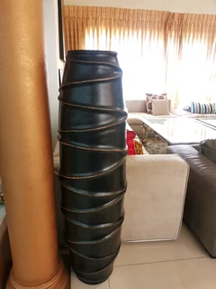 A stunning full length designer vase in brand new condition. Dimensions H140/W40