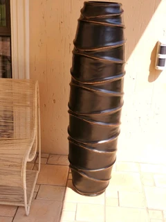 A stunning full length designer vase in brand new condition. Dimensions H140/W40