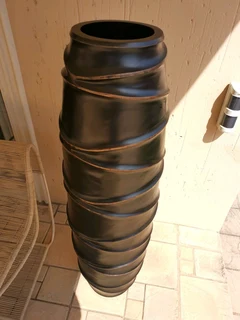 A stunning full length designer vase in brand new condition. Dimensions H140/W40