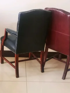 Buttoned full leather arm chairs x8 priced per each