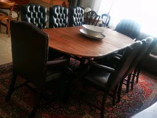 Buttoned full leather arm chairs x8 priced per each