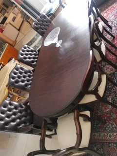 Buttoned full leather arm chairs x8 priced per each
