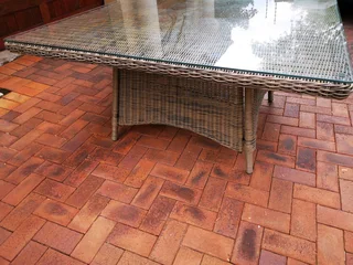 A large 8 seater dinning table. high quality weather resistant PE rattan over aluminium frames