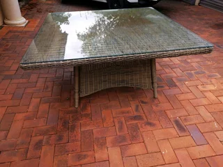 A large 8 seater dinning table. high quality weather resistant PE rattan over aluminium frames