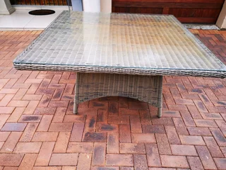A large 8 seater dinning table. high quality weather resistant PE rattan over aluminium frames