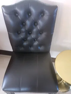 Opulent office/dinning genuine leather buttoned formal chairs.