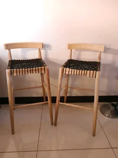 Quality beach wood designer bar stools in exceptional condition, sold per each.