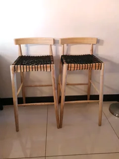 Quality beach wood designer bar stools in exceptional condition, sold per each.