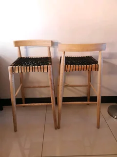 Quality beach wood designer bar stools in exceptional condition, sold per each.