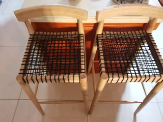 Quality beach wood designer bar stools in exceptional condition, sold per each.