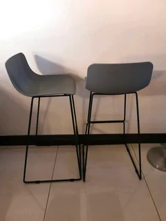 Solid quality designer bar stools in exceptional condition, sold per each.