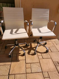 Elegant swivel office chairs, price is for both.