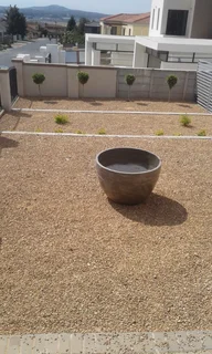 freshlawns compost topsoil and brownstones