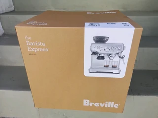 Breville Barista Express BES870BTR Coffee Machine Metallic Brand New Factory Sealed In The Box.