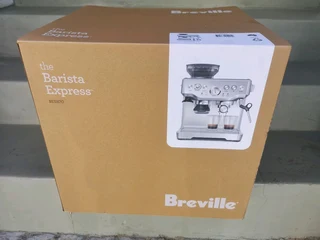 Breville Barista Express BES870BTR Coffee Machine Metallic Brand New Factory Sealed In The Box.