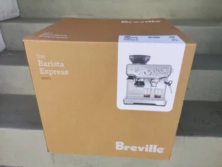 Breville Barista Express BES870BTR Coffee Machine Metallic Brand New Factory Sealed In The Box.