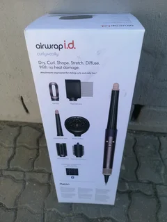 Dyson Airwrap i.d Multi-Styler  Dryer Straight Wavy Brand New Sealed In The Box Never Been Used.