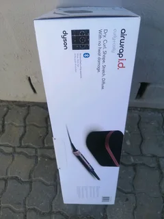 Dyson Airwrap i.d Multi-Styler  Dryer Straight Wavy Brand New Sealed In The Box Never Been Used.