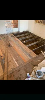 We strip and remove any old wooden floors and replacing with concrete floors