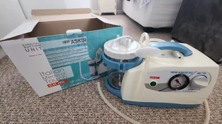 Surgical suction unit