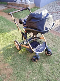 Baby 3 in 1 Belecoo travel system.