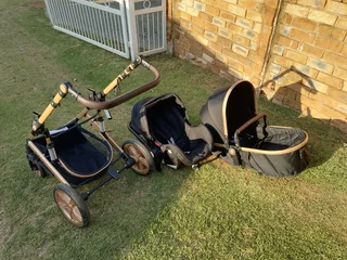 Baby 3 in 1 Belecoo travel system.