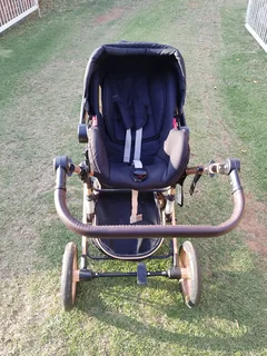 Baby 3 in 1 Belecoo travel system.
