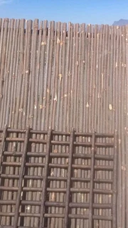 Wooden fence latle and Roll on grass