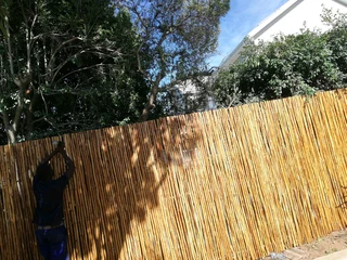 Wooden fence latle and Roll on grass