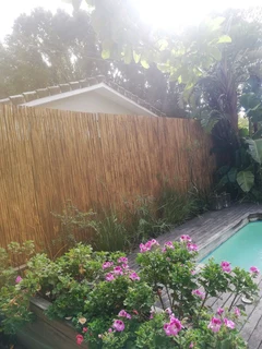 Wooden fence latle and Roll on grass