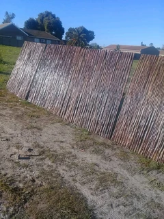 Wooden fence latle and Roll on grass