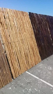 Wooden fence latle and Roll on grass