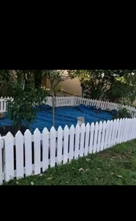Wooden fence latle and Roll grass