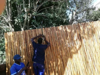 Wooden fence latle and Roll grass