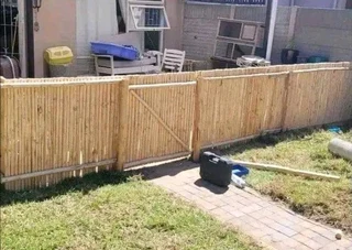 Wooden fence latle and Roll grass