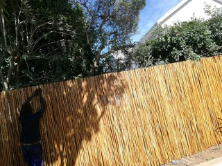 Wooden fence latle and Roll grass