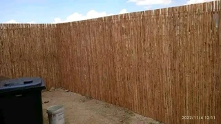 Wooden fence latle and Roll on grass
