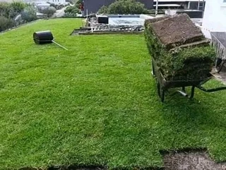 Wooden fence latle and Roll on grass