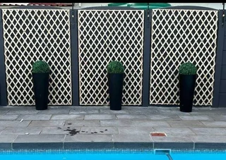 Wooden fence latle and Roll on grass