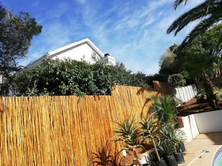 Wooden fence latle and Roll on grass