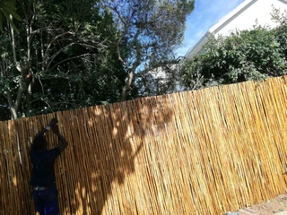 Wooden fence latle and Roll on grass