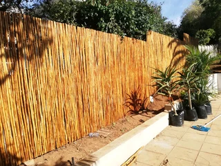 Wooden fence latle and Roll on grass