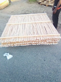 Wooden fence latle and Roll on grass