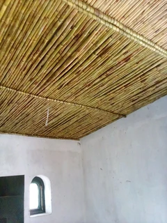 Wooden fence latle,bamboo and Roll on grass